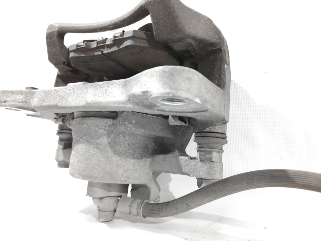 3 Супорт гальмівний передній правий Mazda 3 2014-2019 B4Y03398ZC Mazda 3 11