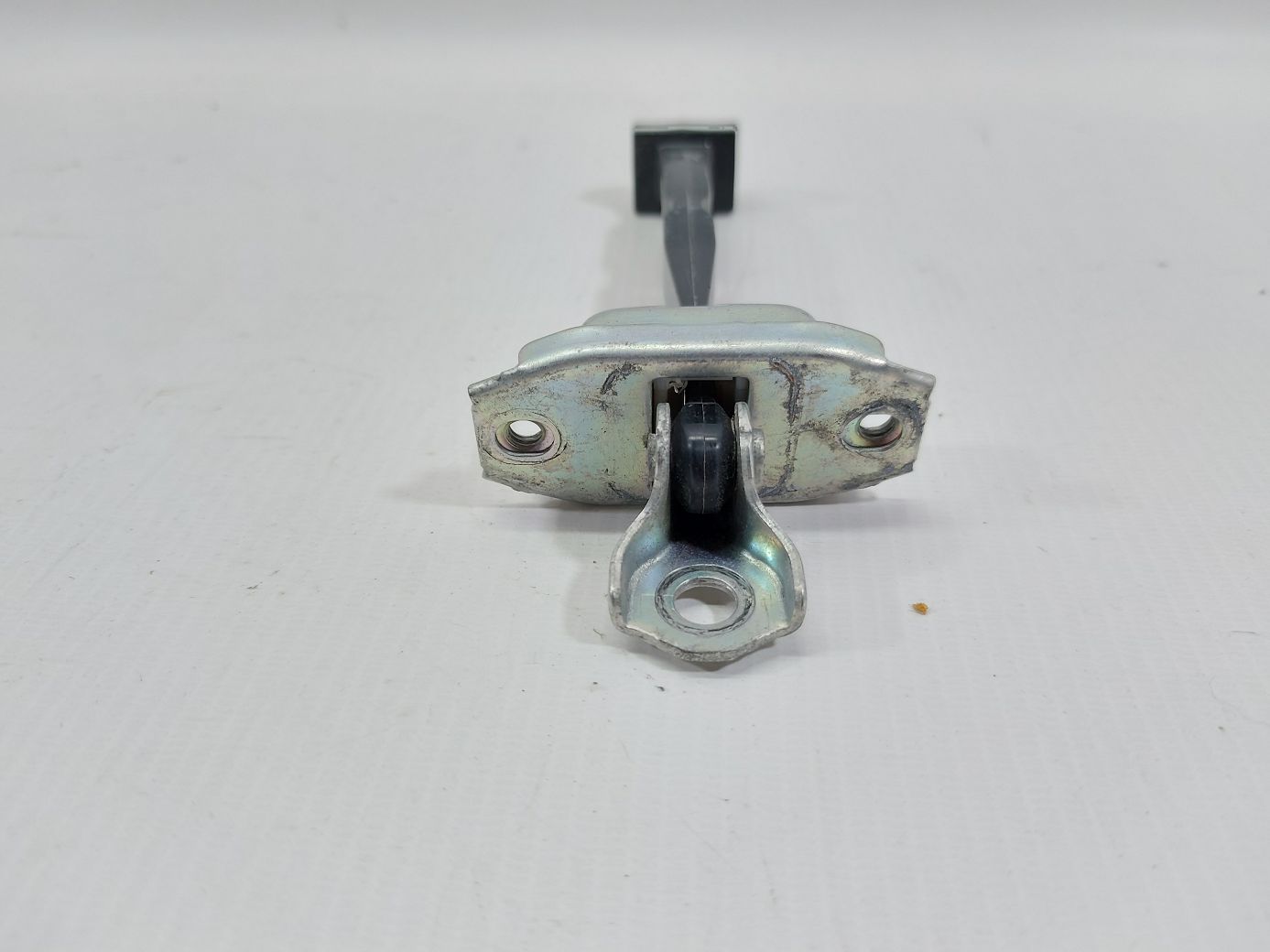 Versa note Ограничитель двери передней левой Nissan Versa Note 2014-2019 804303VA0B Nissan Versa Note 3