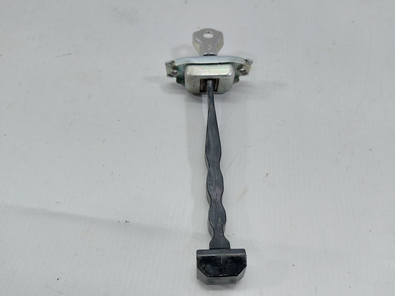 Versa note Обмежувач дверей задньої лівої Nissan Versa Note 2014-2019 824303VA0B Nissan Versa Note 3