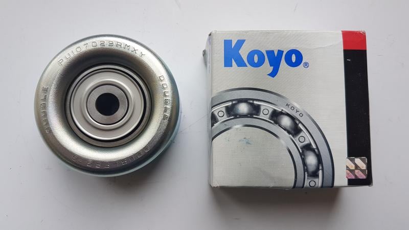 Натяжители ремня. Ролик натяжной KOYO PU107029RMXY