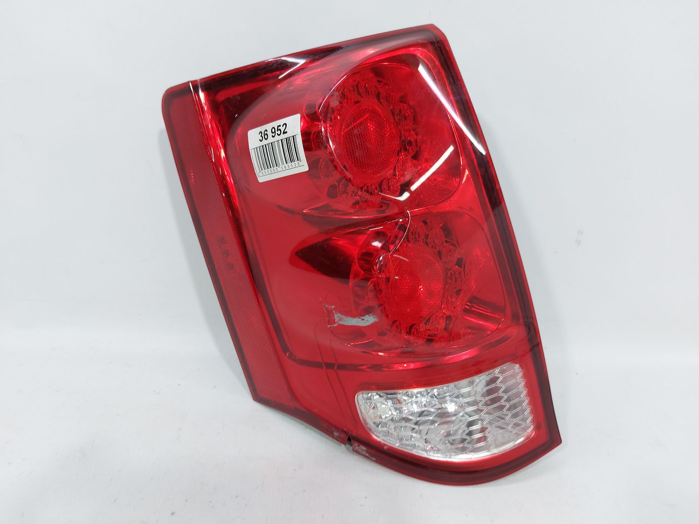 Товары с дефектами. Фонарь задний левый (трещина DEPO) Dodge Grand Caravan 2011-2020 5182533AF Dodge Grand Caravan