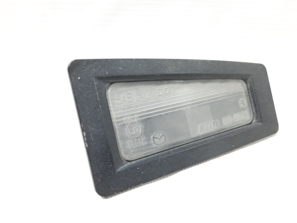 3. Ліхтар підсвічування номера правий Mazda 3 2014-2019 B45A51270B Mazda 3