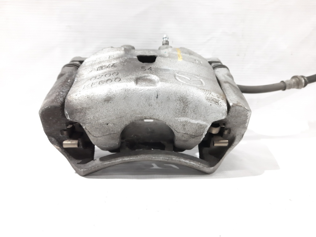 3 Супорт гальмівний передній правий Mazda 3 2014-2019 B4Y03398ZC Mazda 3 6