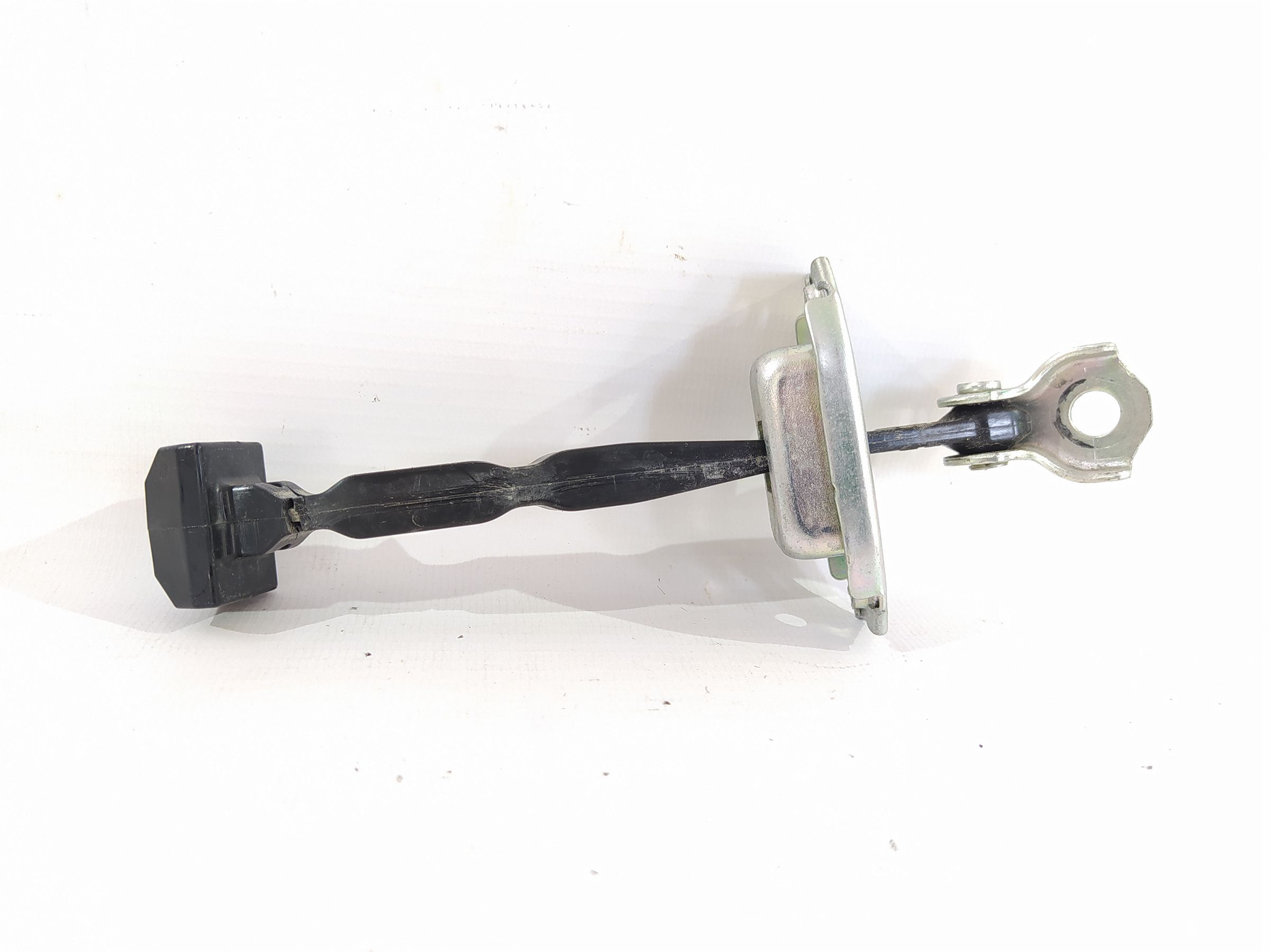 Versa note Обмежувач двері передньої лівої Nissan Versa Note 2014-2019 804303VA0B Nissan Versa Note 4