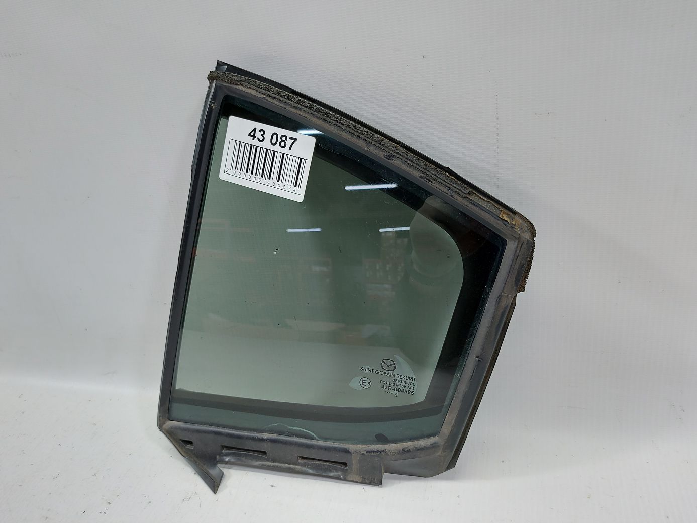 3. Форточка дверей задньої лівої (з тонуванням) Mazda 3 2014-2018 BJS773661 Mazda 3