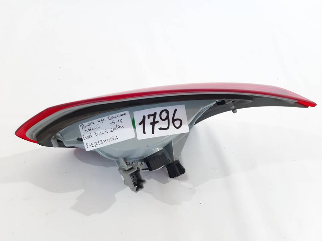 Товары с дефектами Фонарь крышки багажника левый (дефект) Ford Focus sedan `2015-2018 F1EZ13405A Ford Focus sedan 4