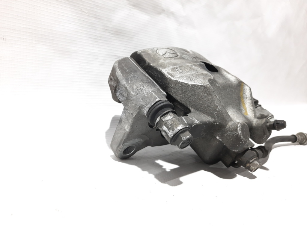 3 Супорт гальмівний передній лівий Mazda 3 2014-2019 B4Y03399ZC Mazda 3 8