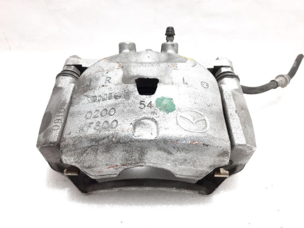 3. Супорт гальмівний передній правий Mazda 3 2014-2019 B4Y03398ZC Mazda 3