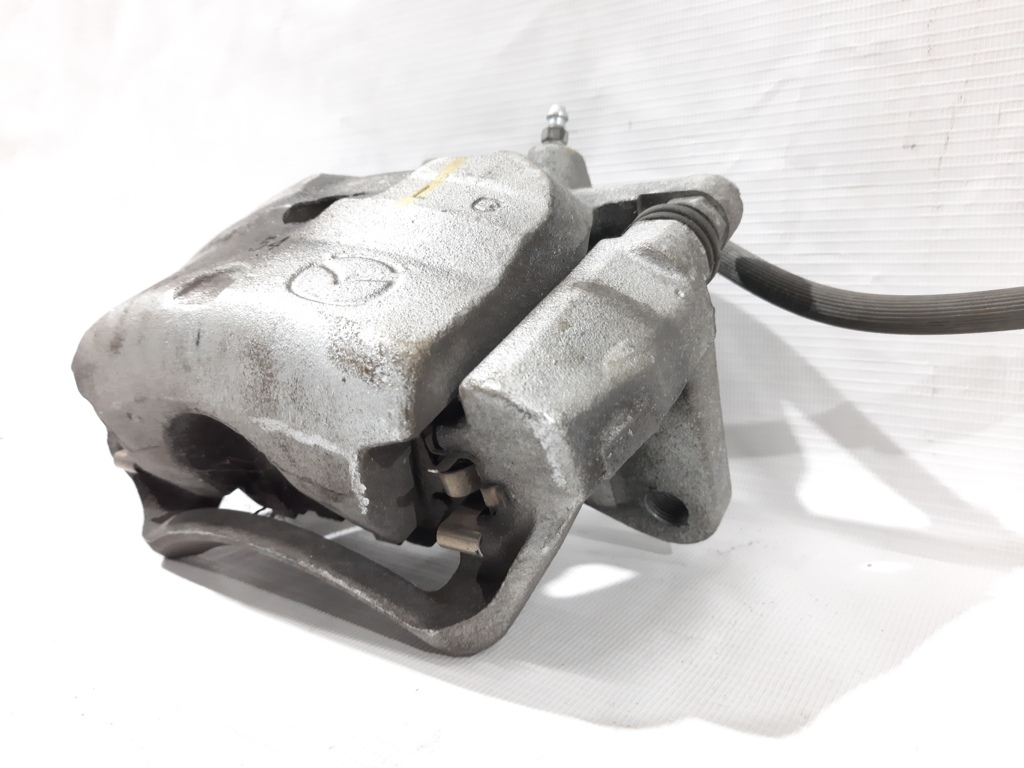 3 Супорт гальмівний передній правий Mazda 3 2014-2019 B4Y03398ZC Mazda 3 7