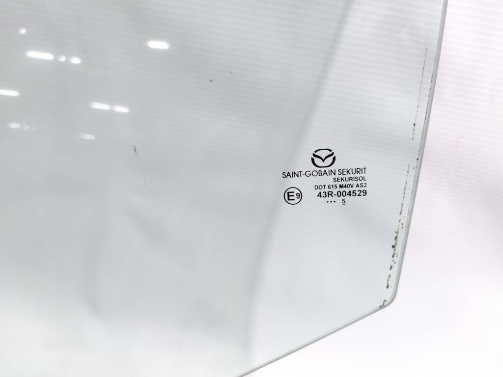 3 Скло дверей задньої лівої Mazda 3 2014-2018 BJS773510 Mazda 3 2